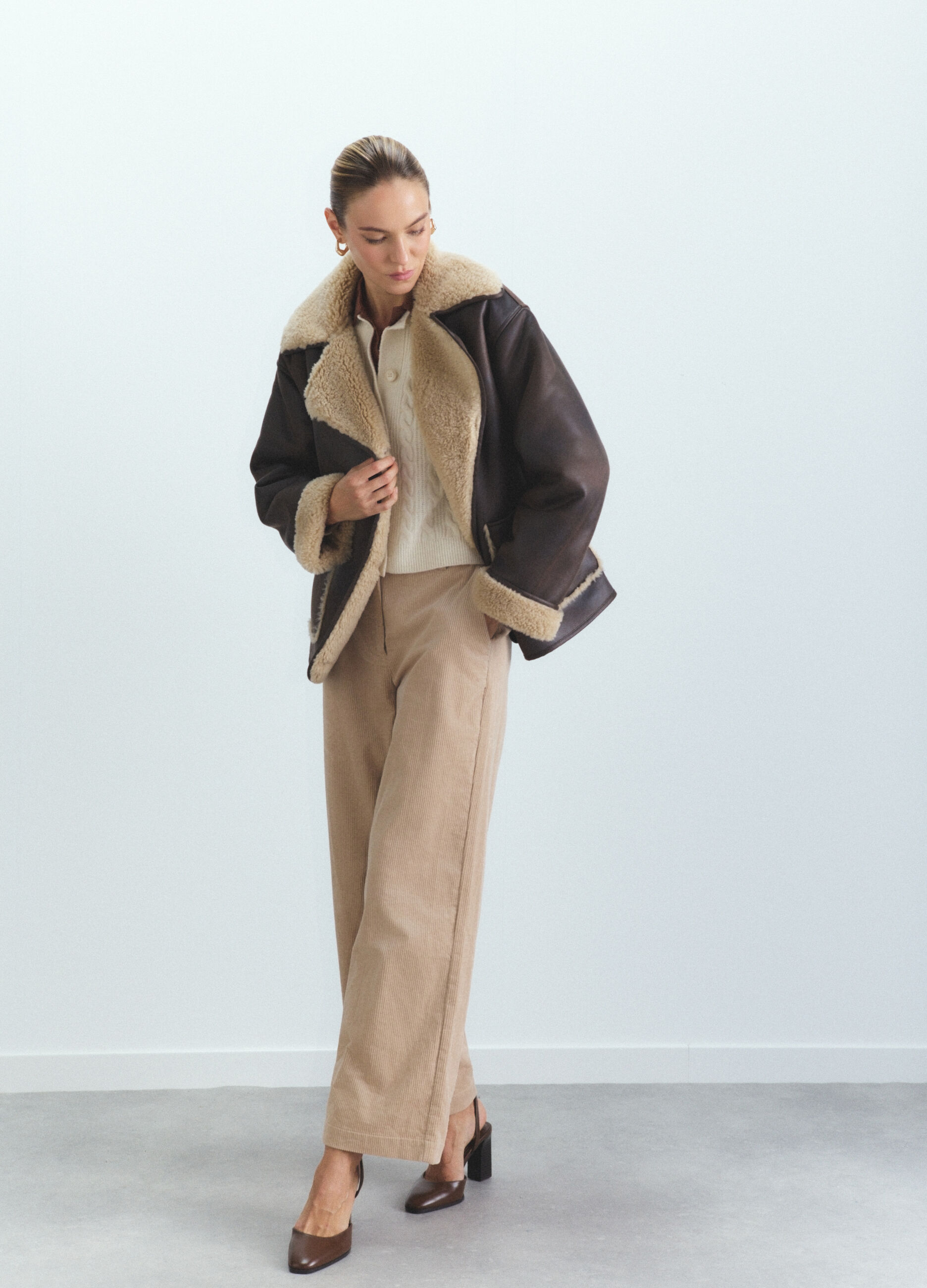 Eco montone con scollo reverse donna_0