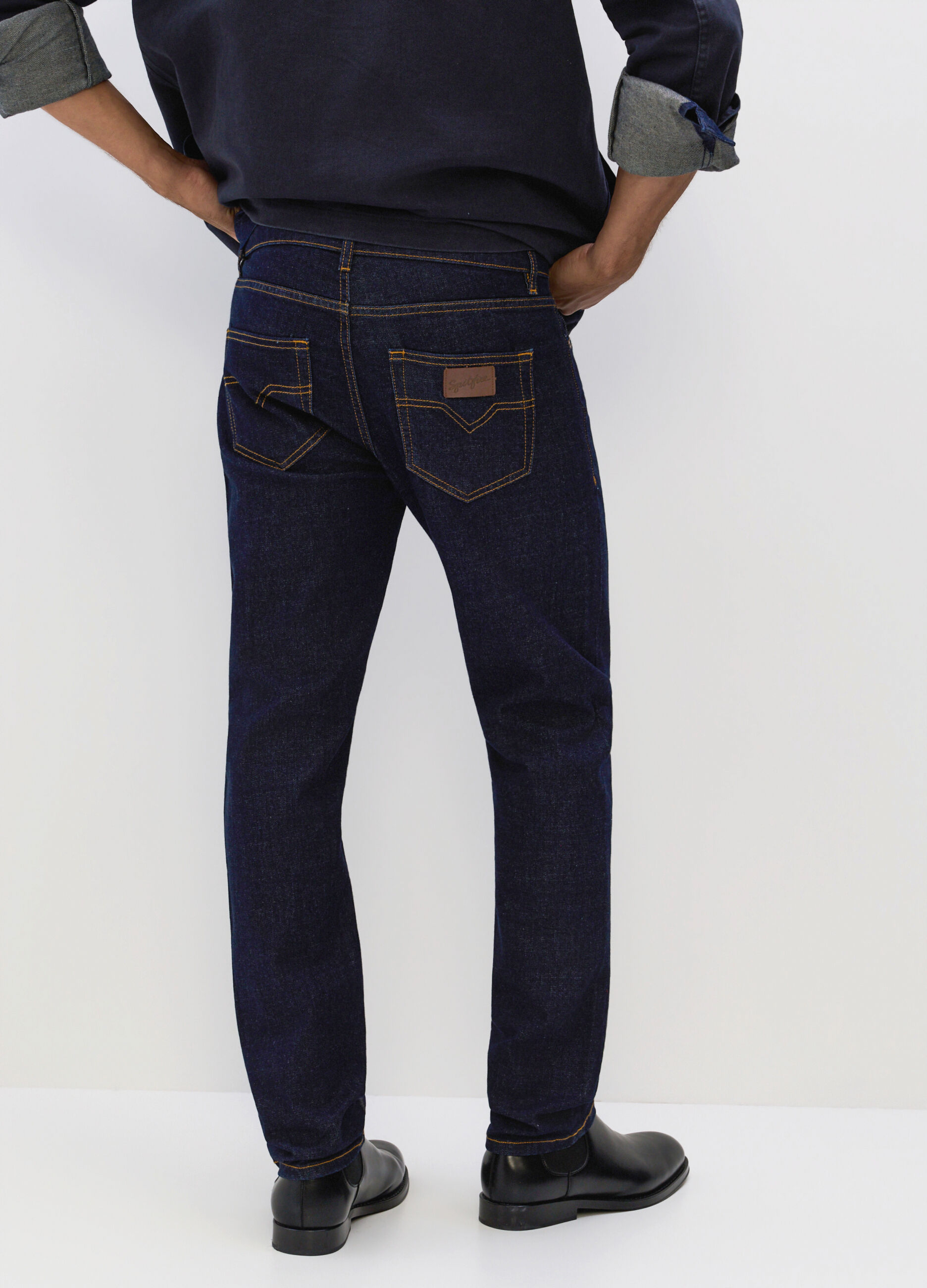 Jeans slim fit in denim lavato uomo_1