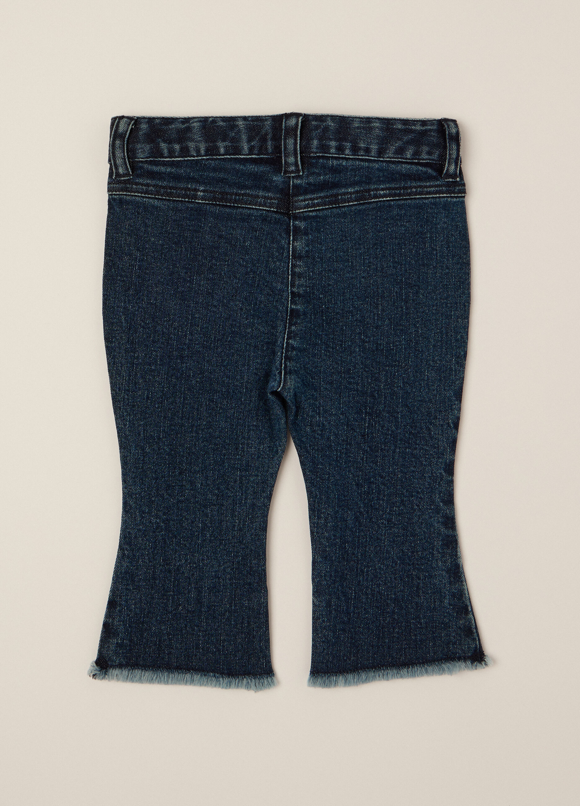 Pantaloni denim elasticizzati a zampa