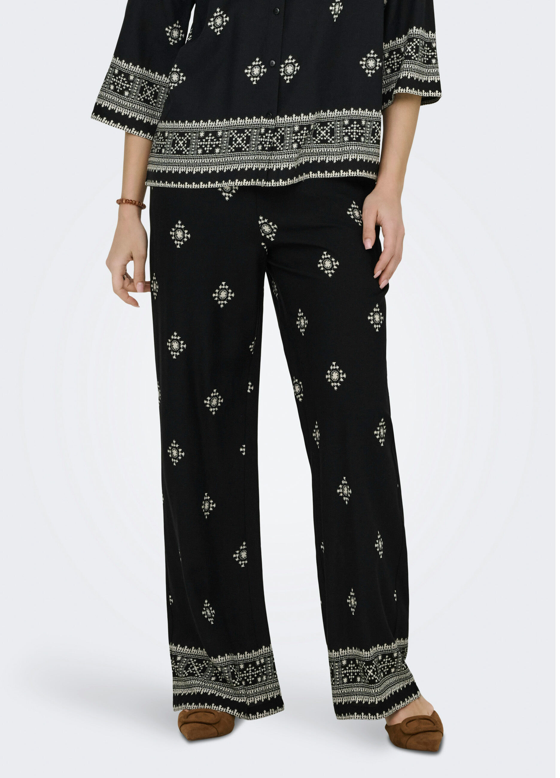 Pantaloni con stampa donna_1