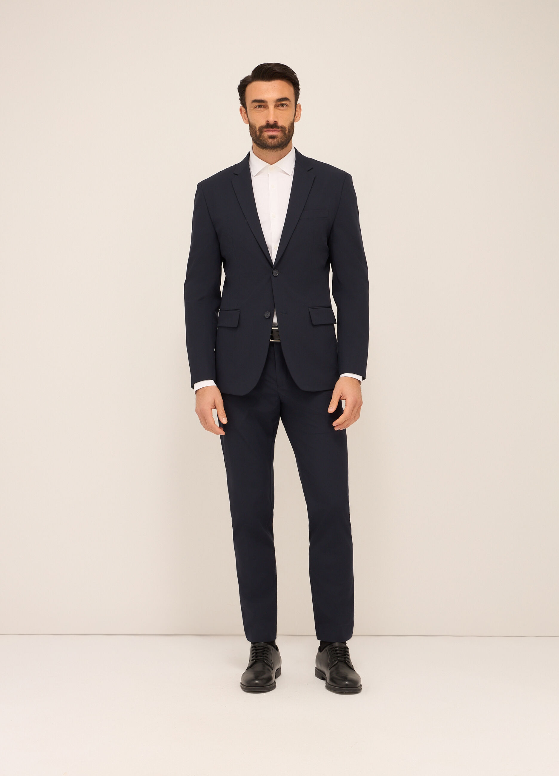 Pantaloni classici in tessuto stretch uomo_0