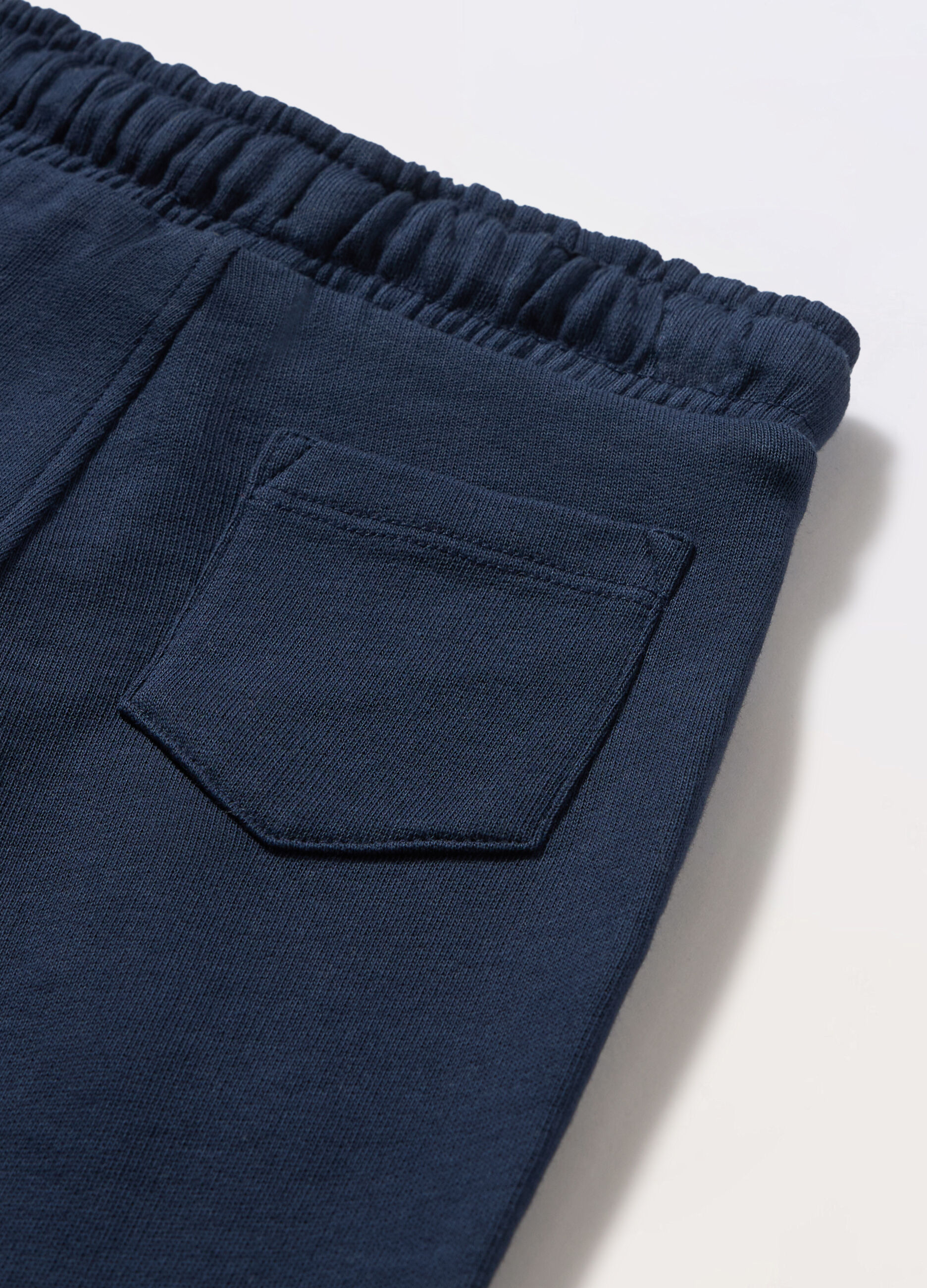 Jogger in french terry di puro cotone neonato_1