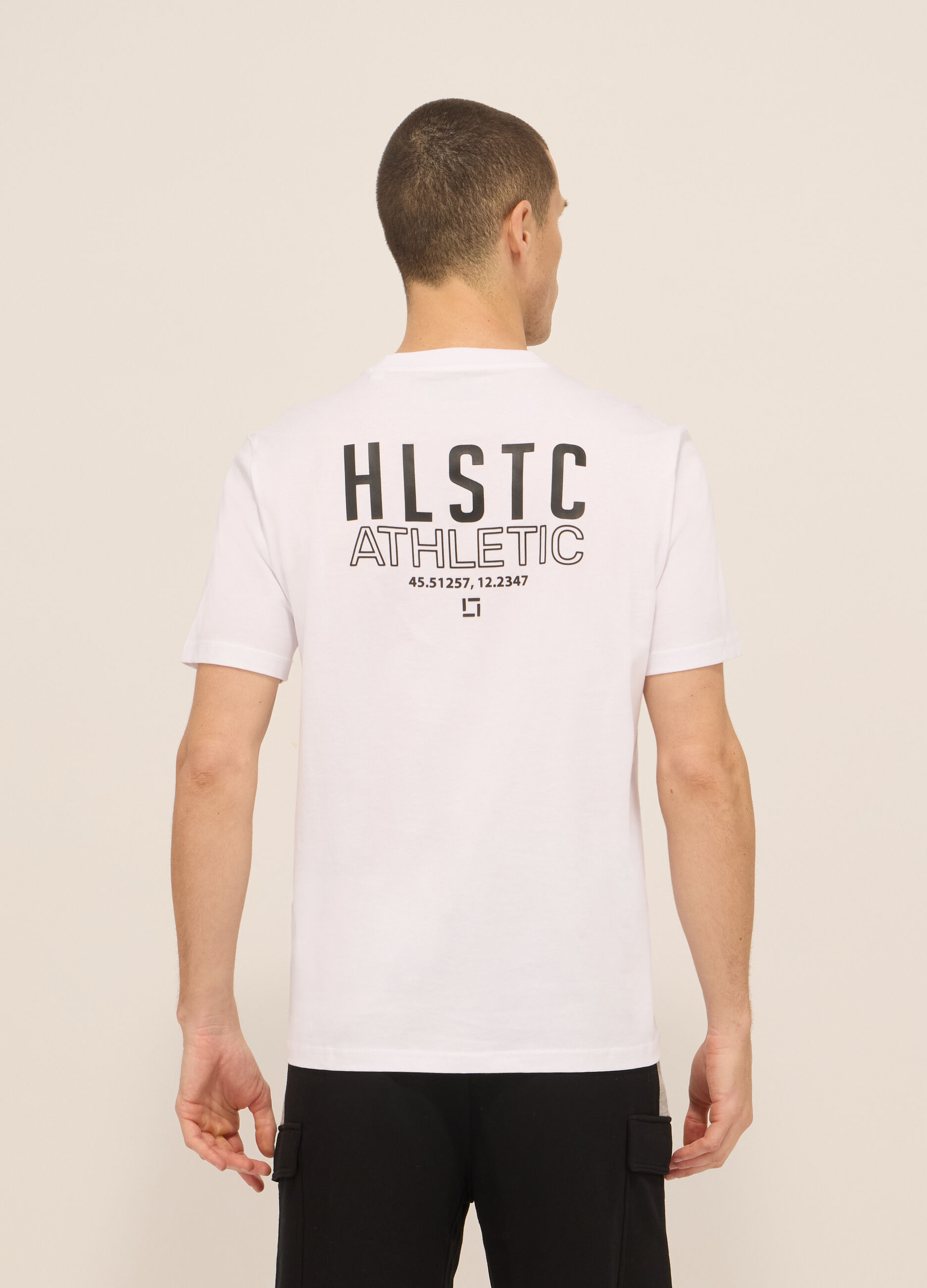 T-shirt sportiva con lettering in cotone uomo_1