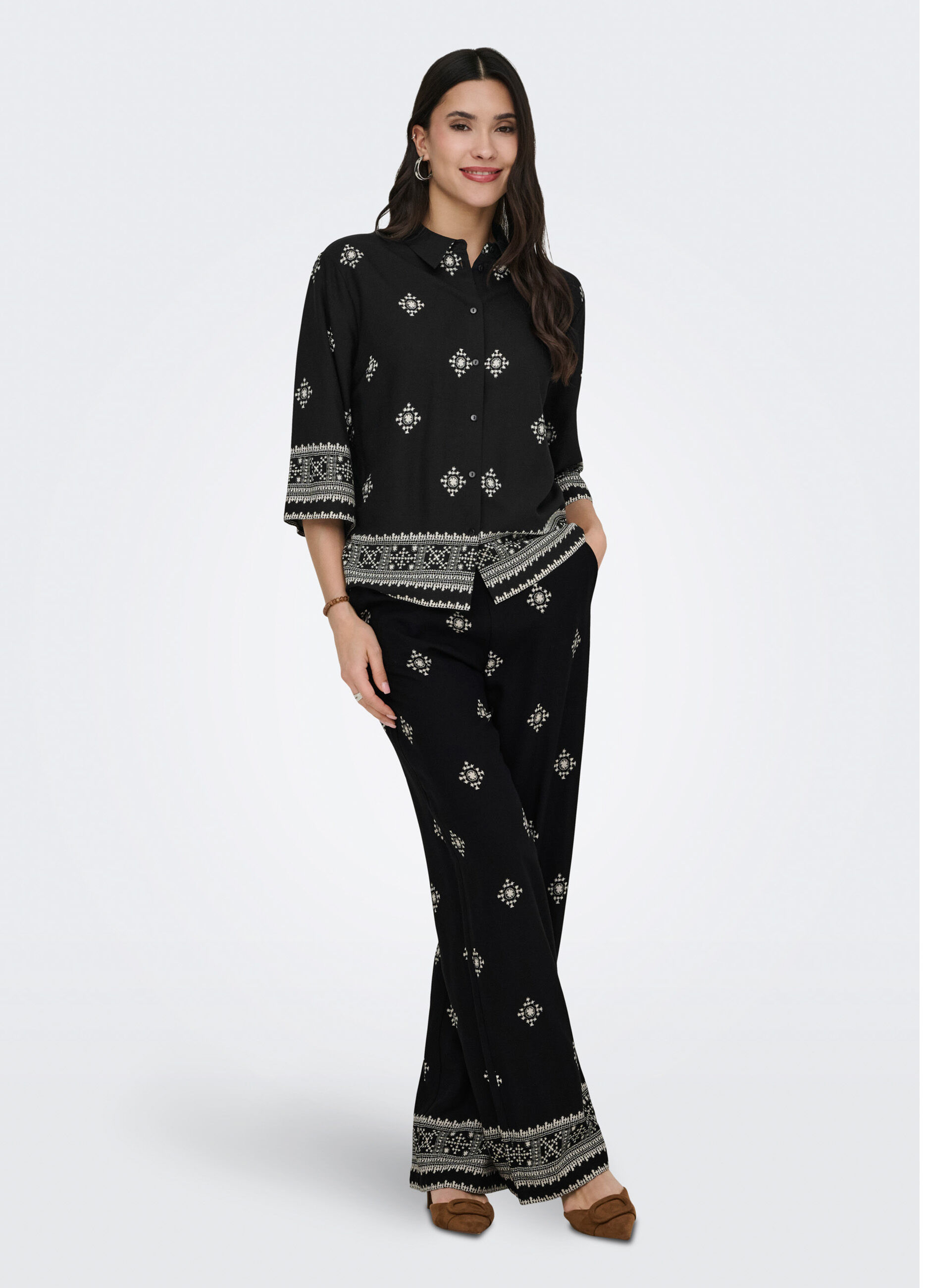 Pantaloni con stampa donna_0