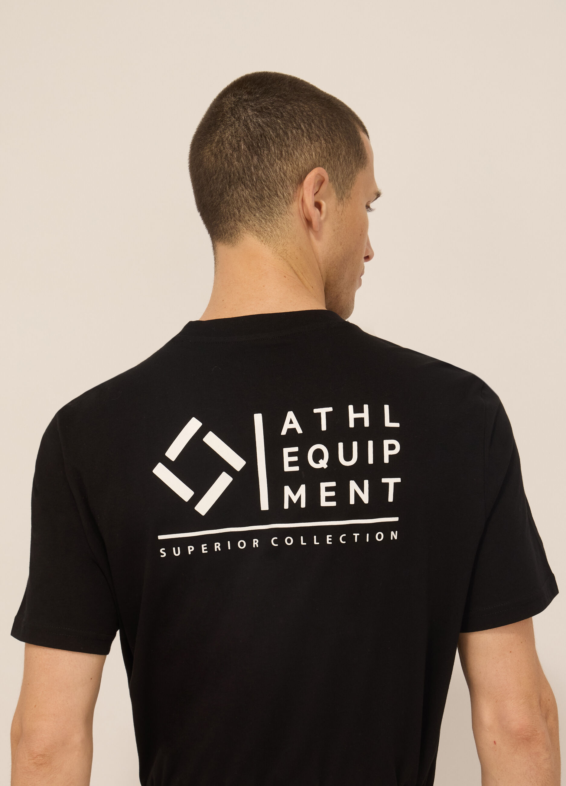 T-shirt sportiva con lettering in cotone uomo_2