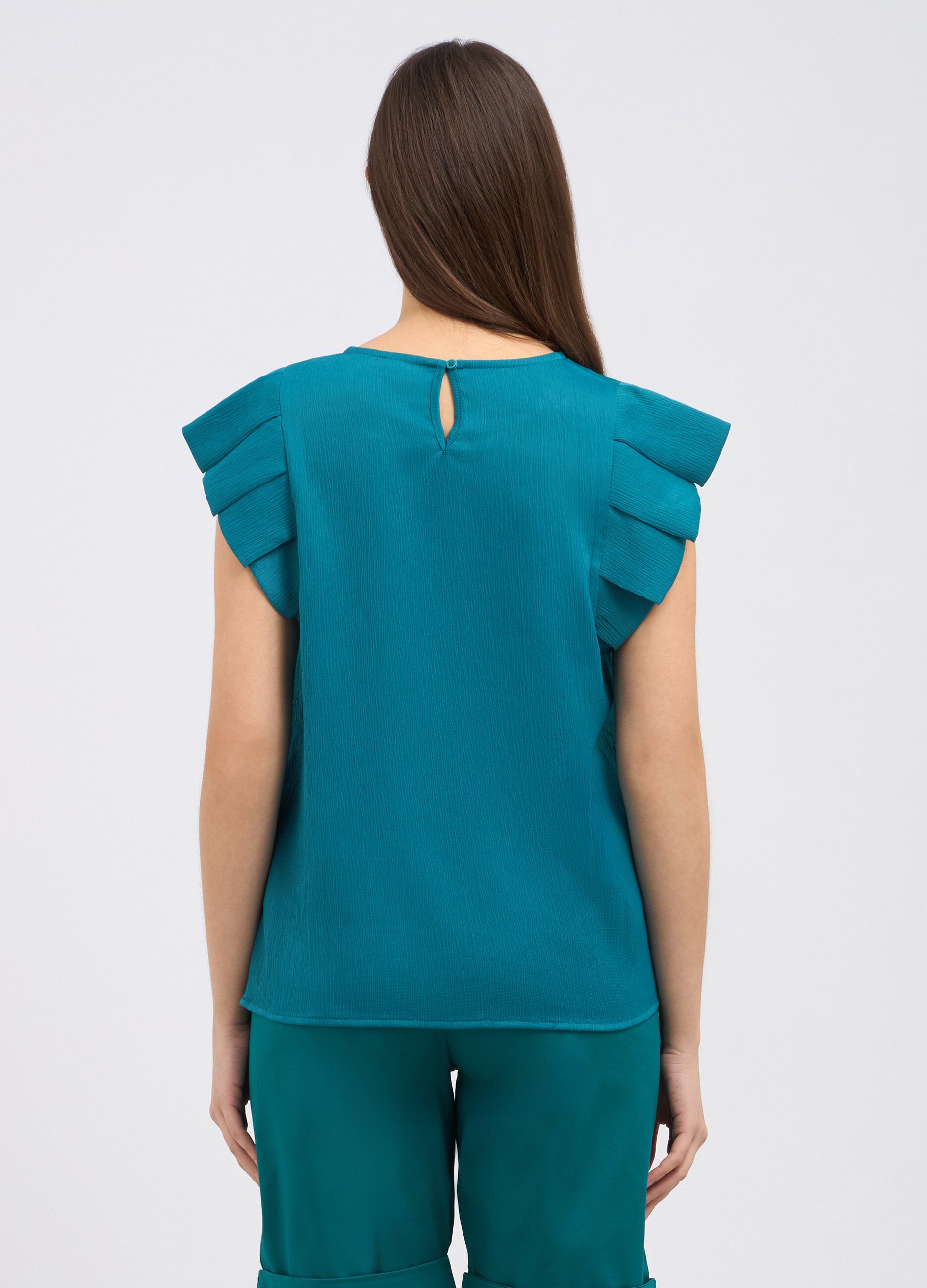 Blusa creponne con rouches donna