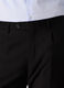 Pantalone regular con pince in twill stretch uomo_2
