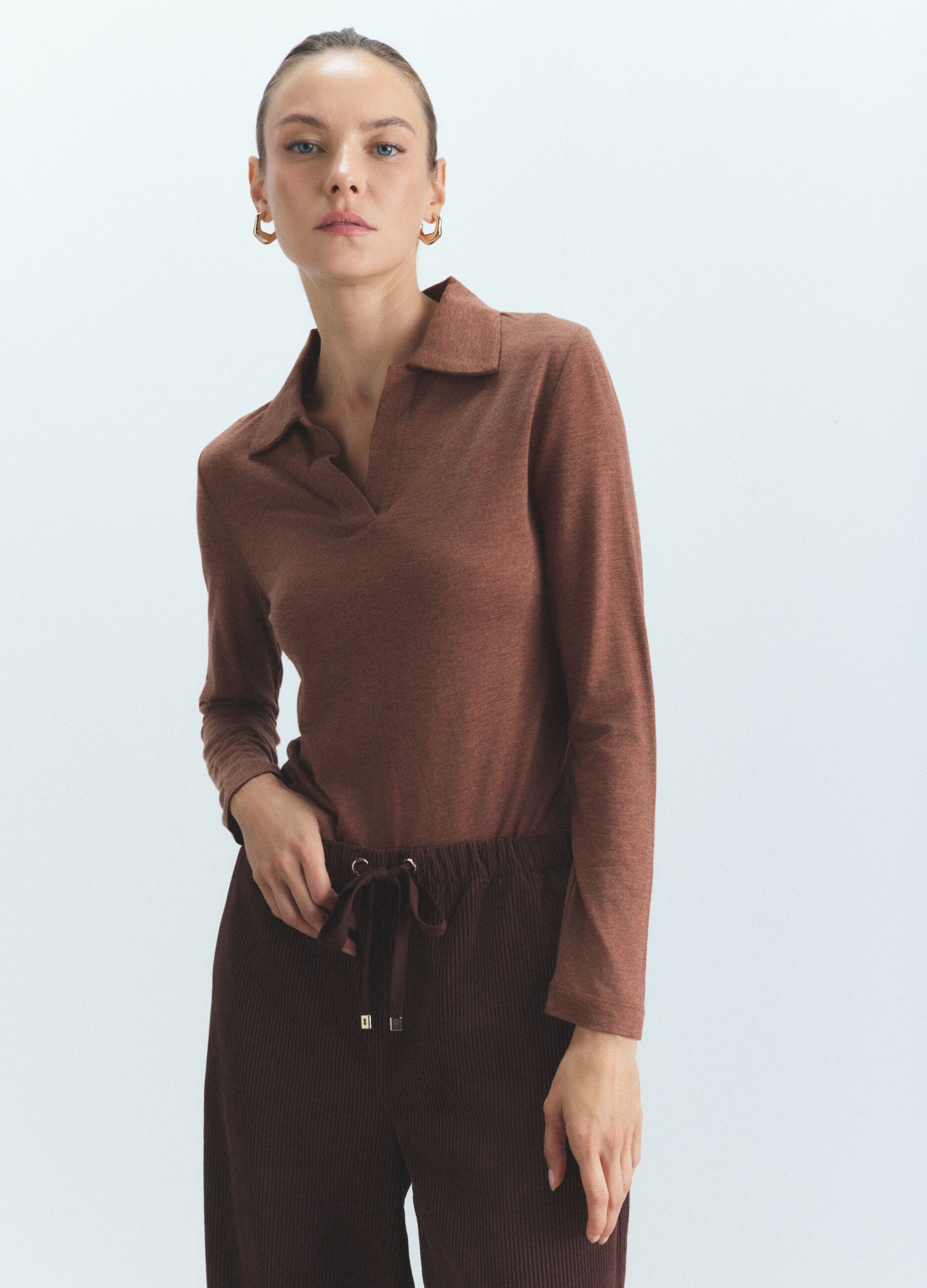 Maglia polo rasata donna_1
