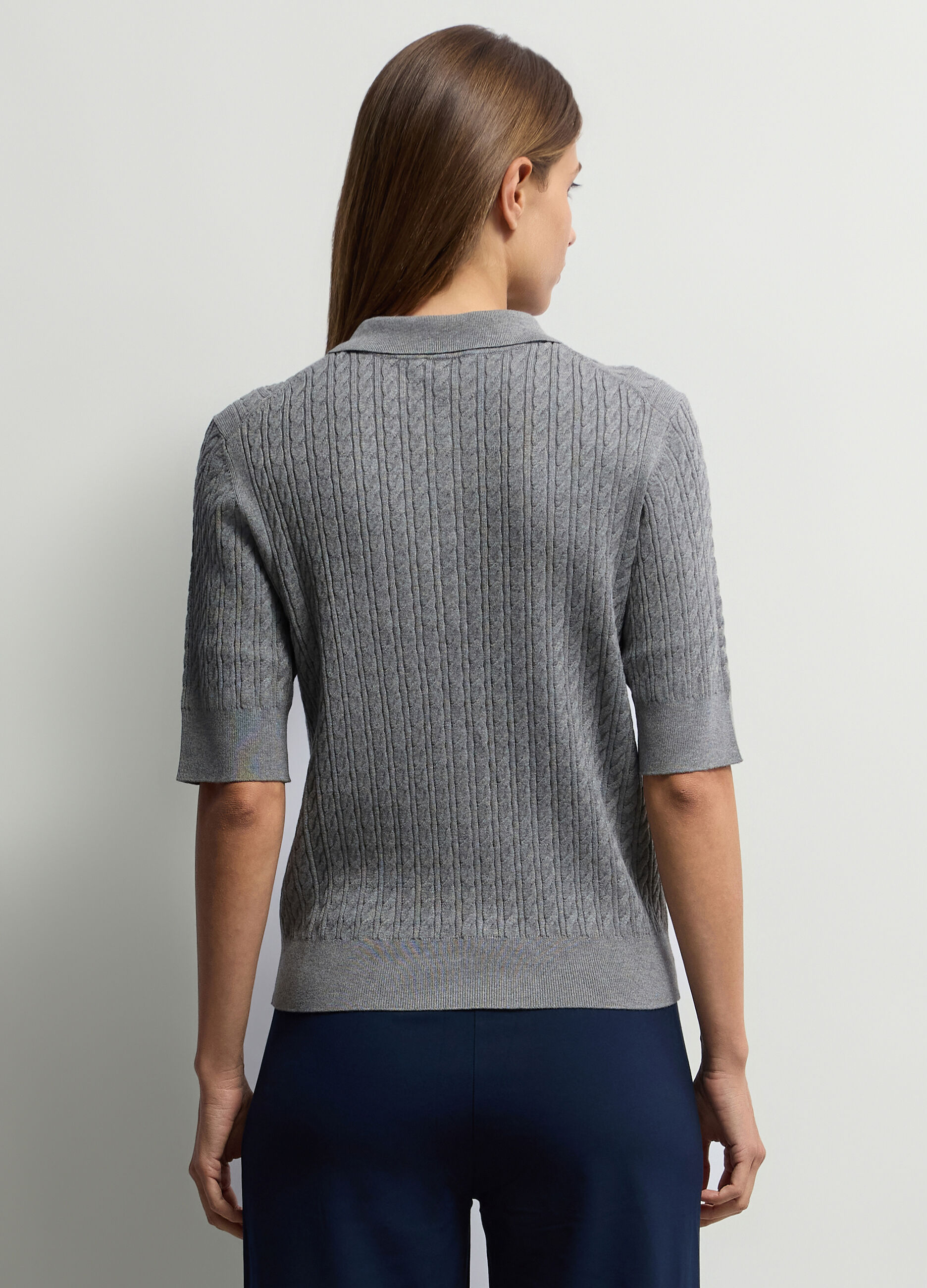 Polo con lavorazione a treccia donna_1