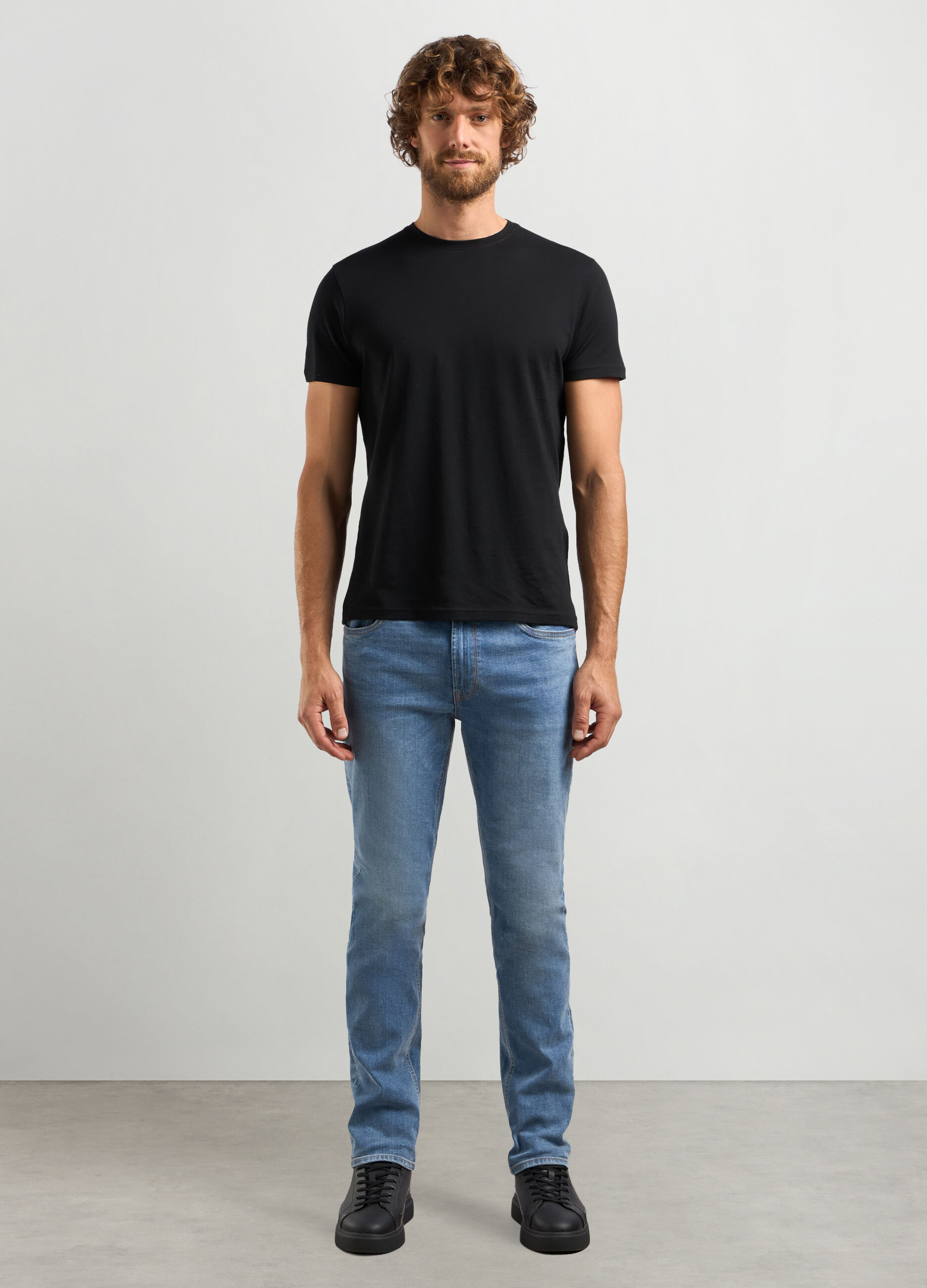 Jeans slim fit in cotone stretch uomo_0