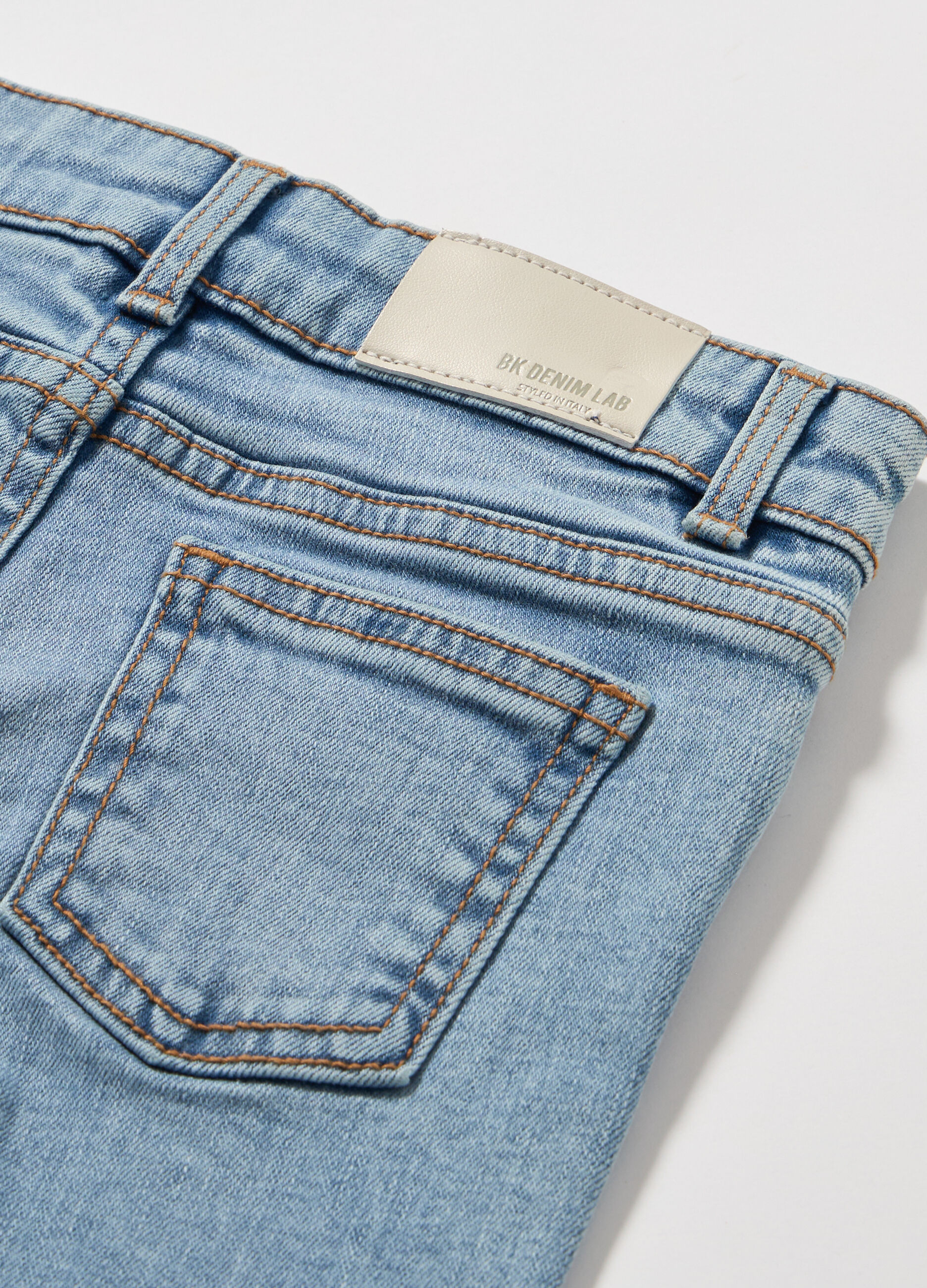 Pantaloni in denim di cotone stretch bambina_1