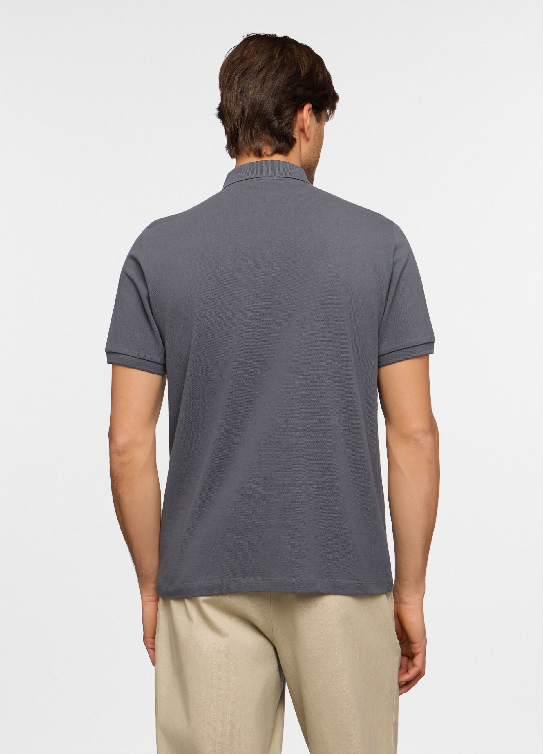 Polo a maniche corte con bottone uomo_1