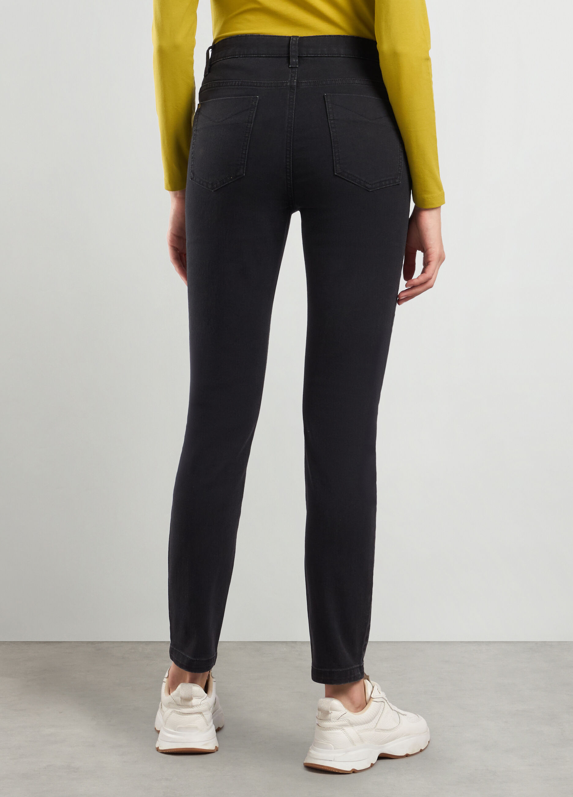 Pantaloni in denim stretch donna_1