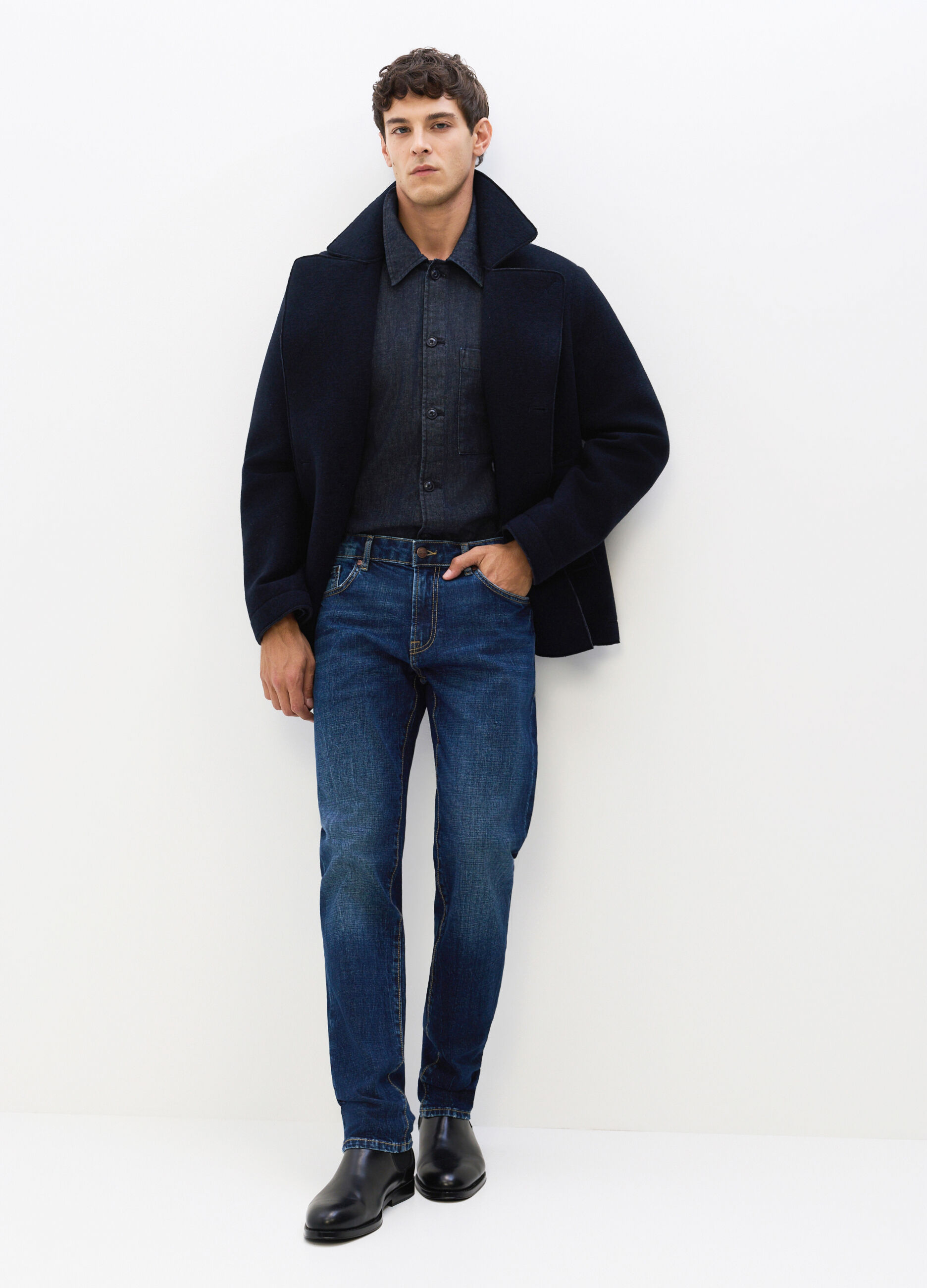 Jeans slim fit in denim lavato uomo_0