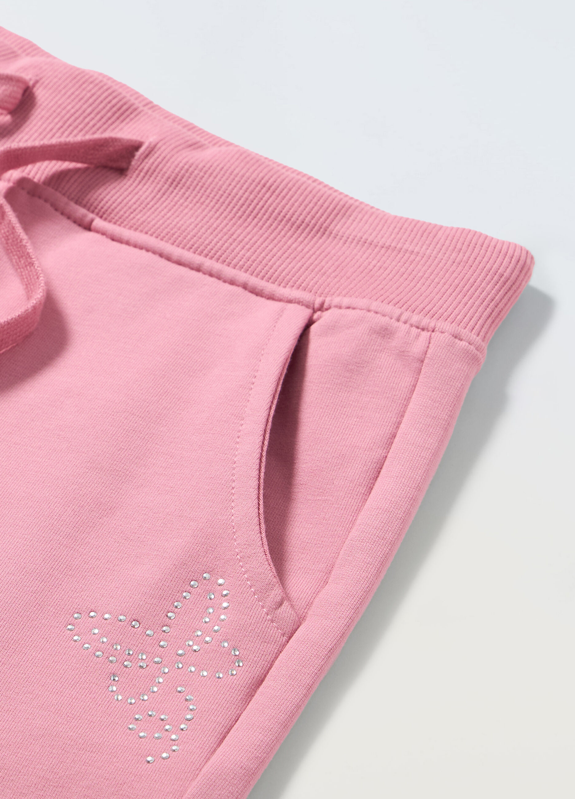 Joggers con strass in french terry stretch bambina_1