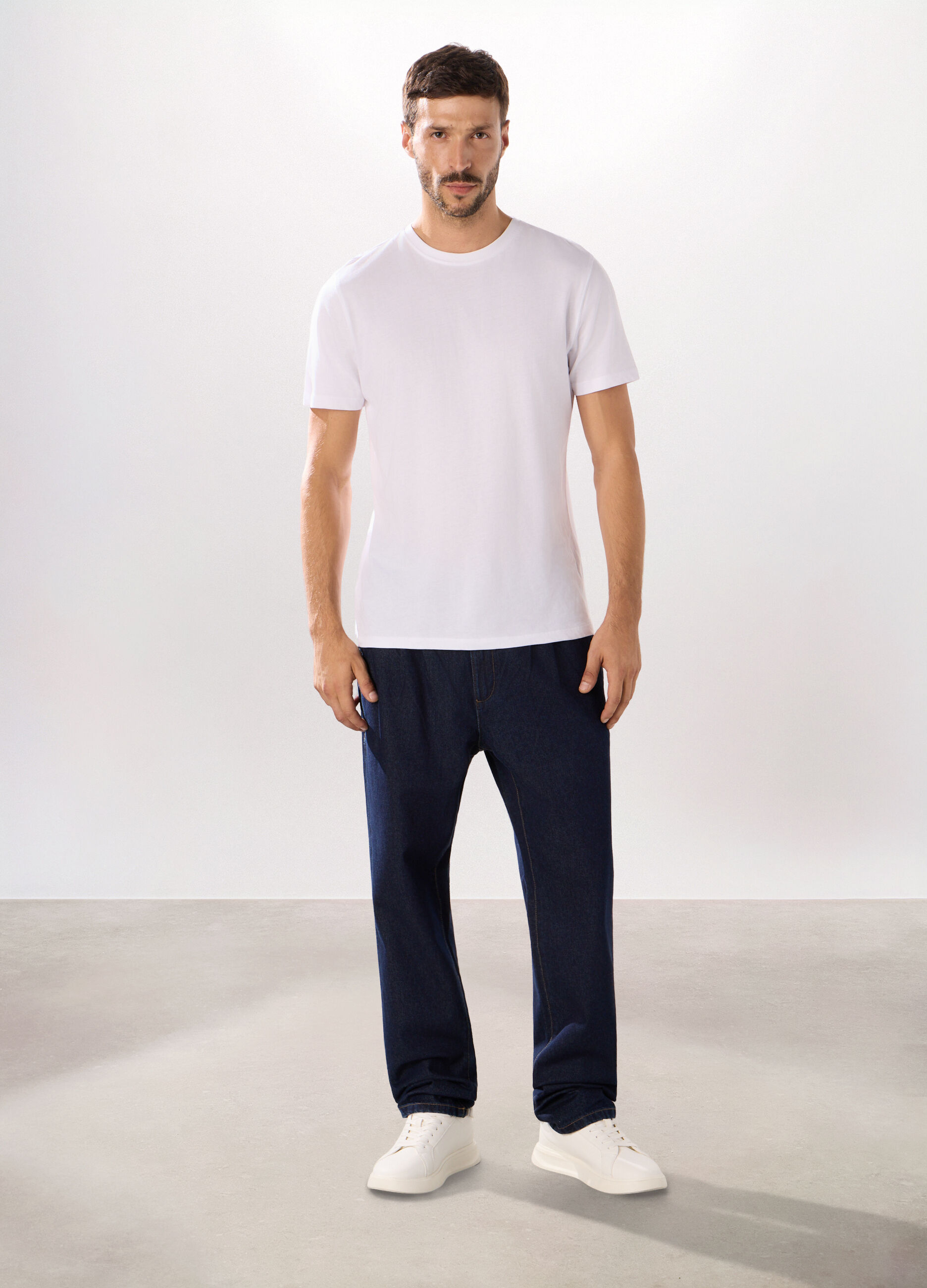 Chino in denim di cotone uomo_0