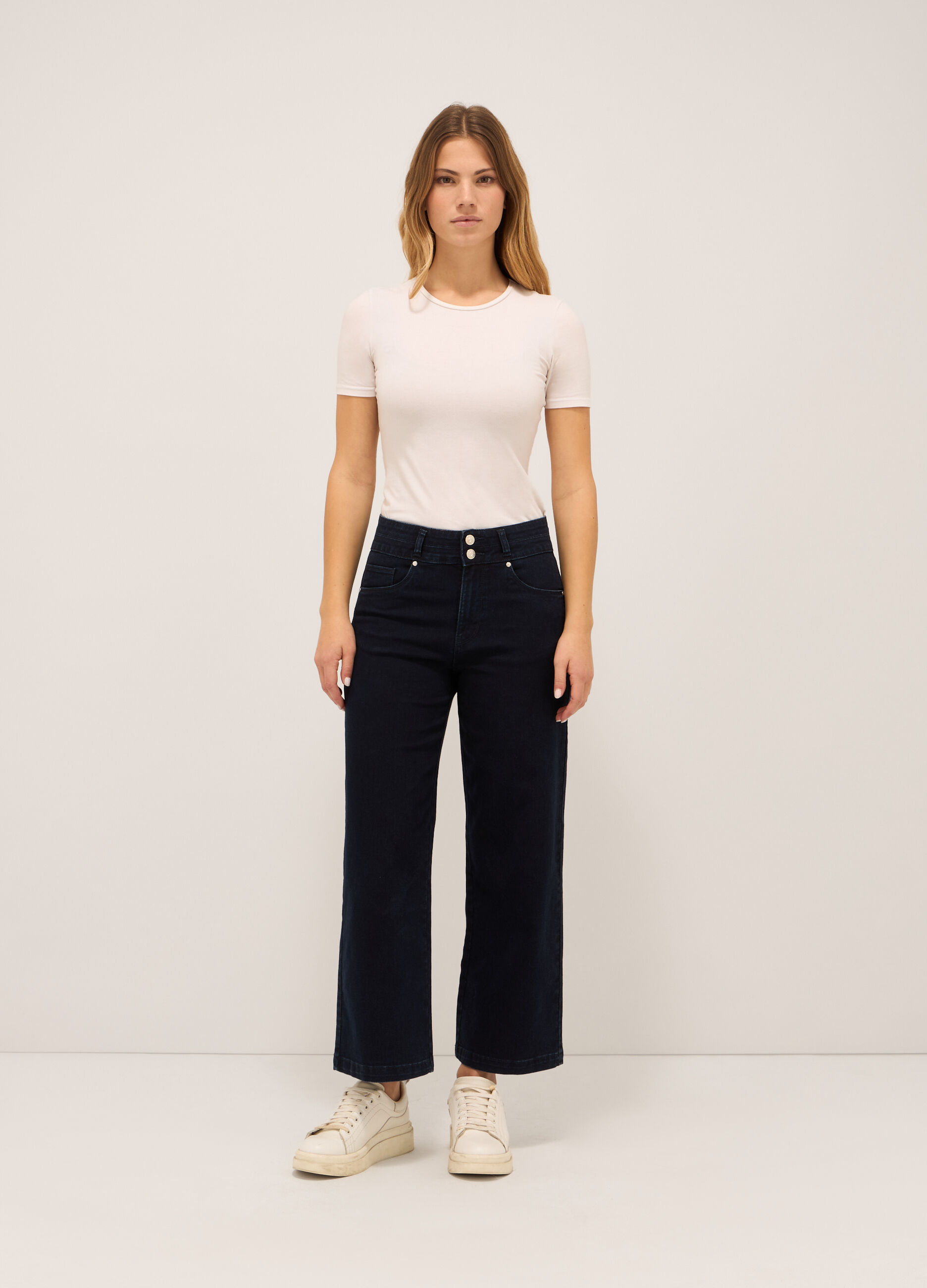 Pantaloni in denim stretch di misto cotone _0