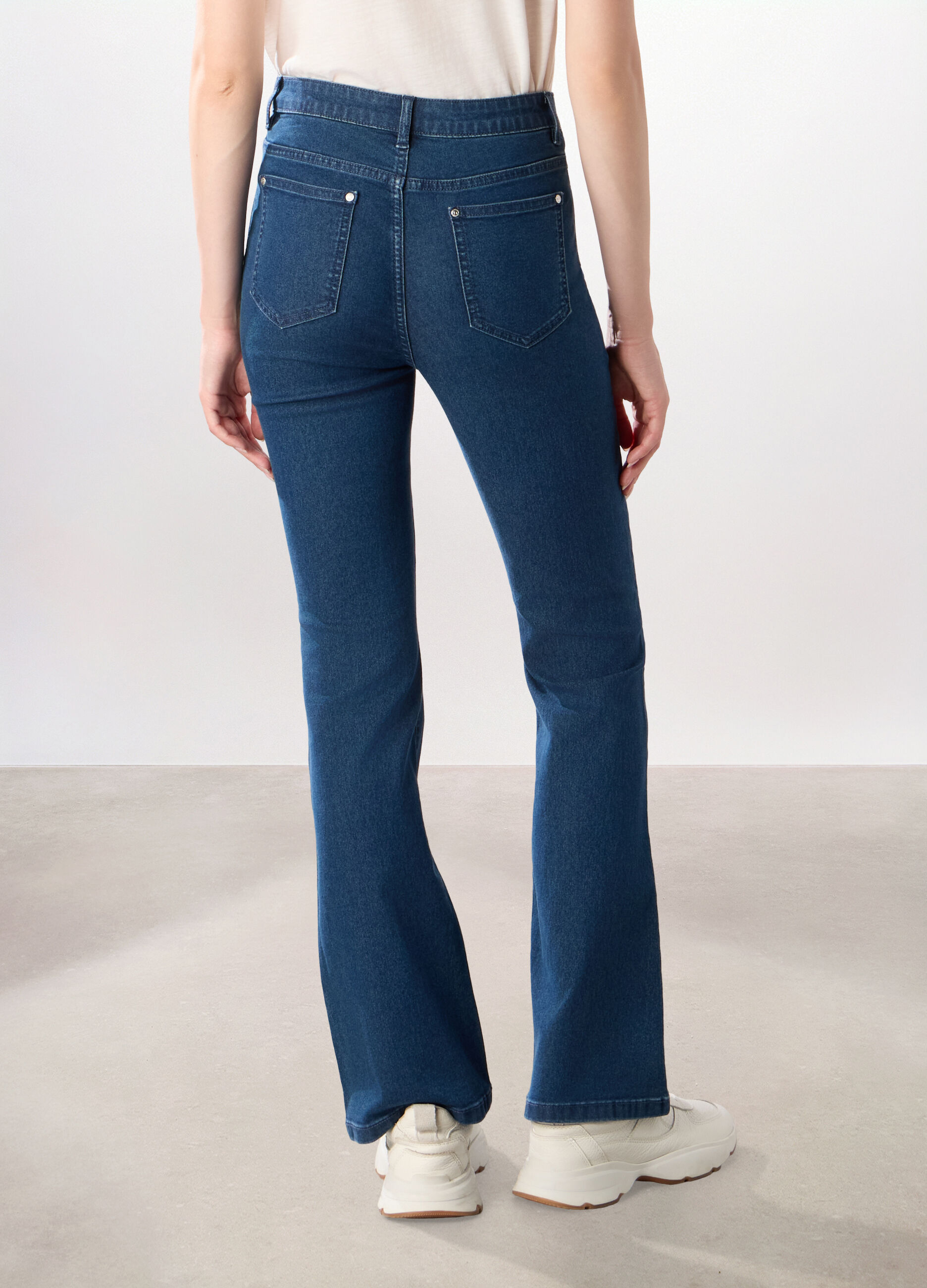 Pantaloni in denim misto cotone donna_1